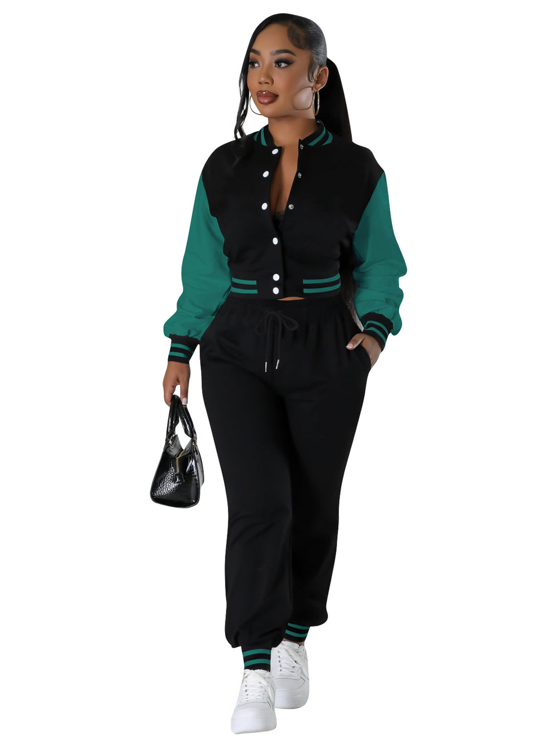 Black varsity jacket with green sleeves and drawstring joggers, ribbed stripe cuffs.