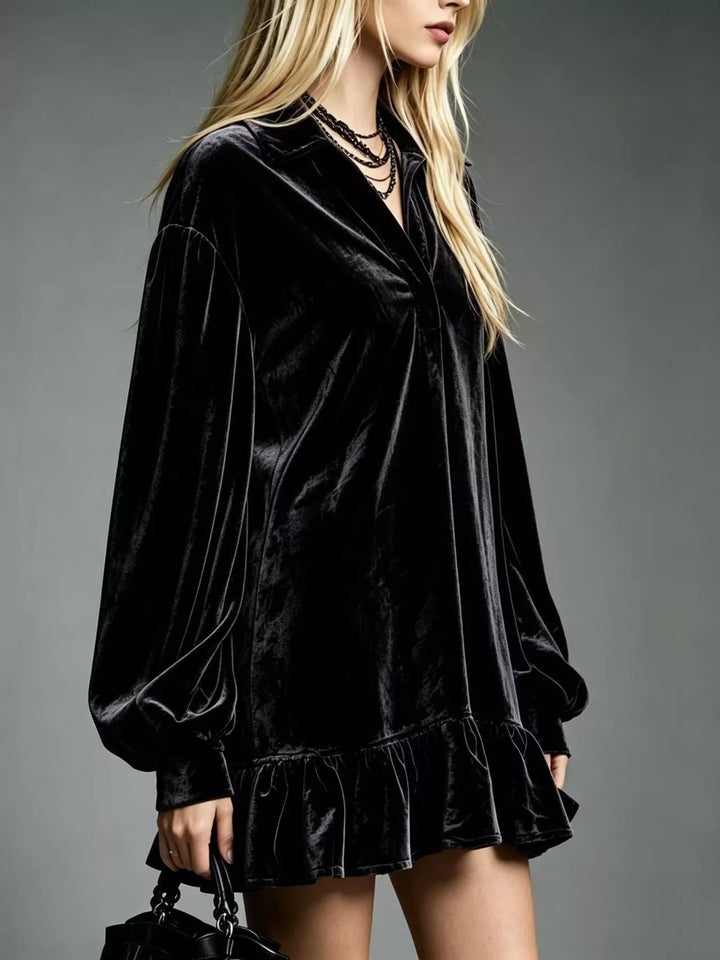Black velvet long-sleeve mini dress with gathered ruffle hem and V-neck