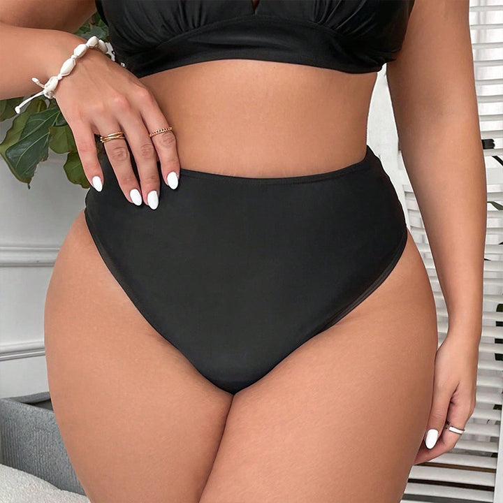 Women's wearing black Plus Size Hollow-Out One-Piece Wrap Vacation Swimsuit