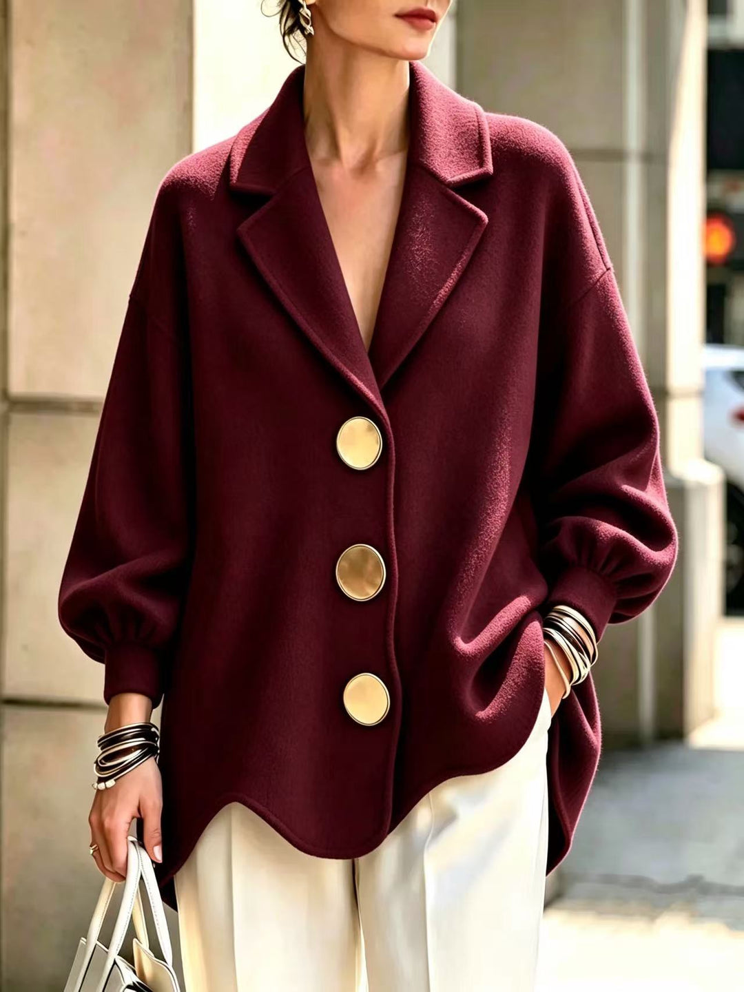 Women's Wine Red V-Neck Blouse With Gold-Tone Buttons, Puff Sleeves And Curved Hem, Close Front View
