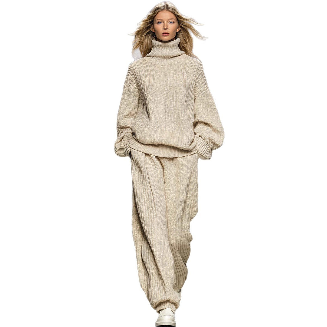 Off-white ribbed knit two-piece set with high-neck top and wide-leg pants, long sleeves