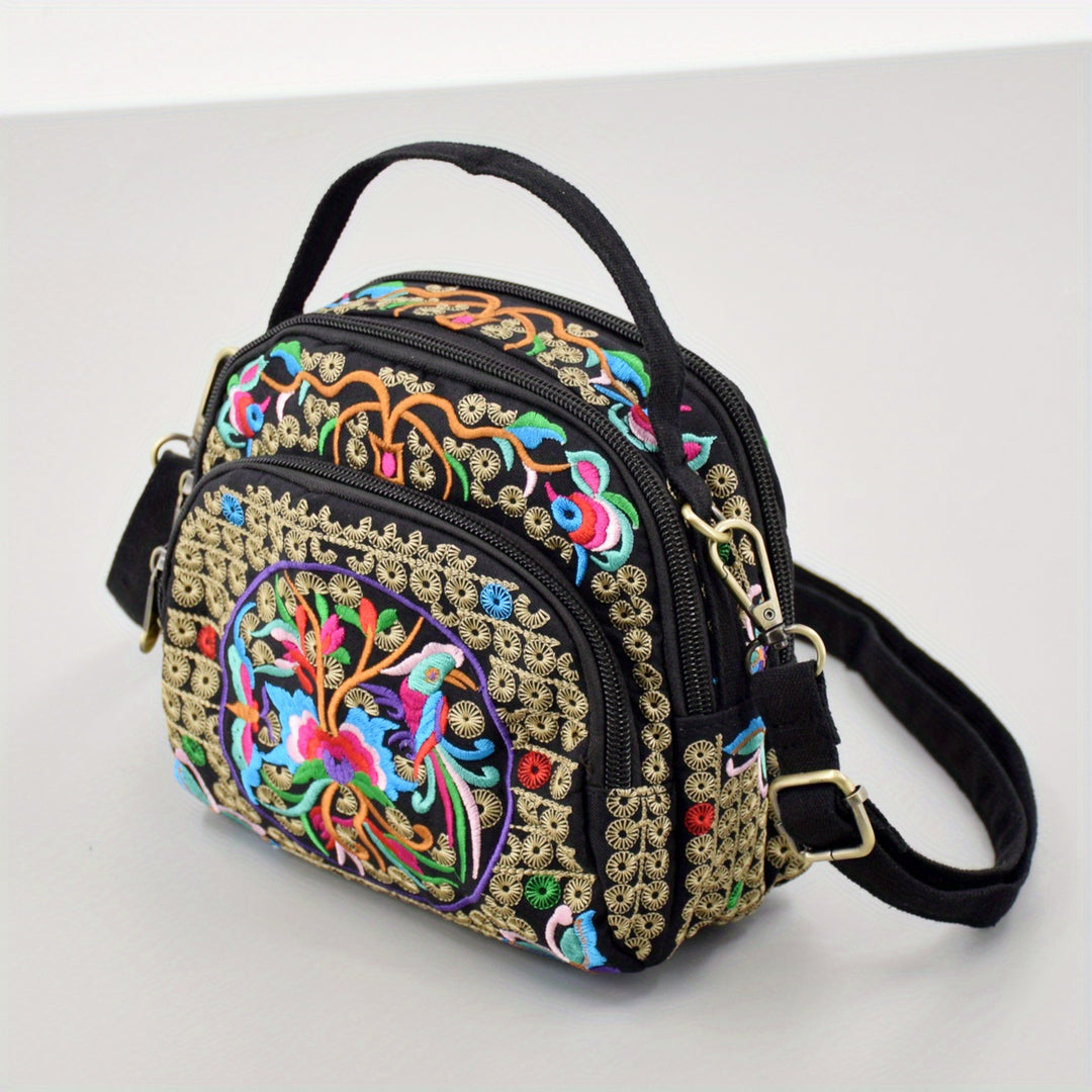 Colorful embroidered bag with intricate designs on a white background