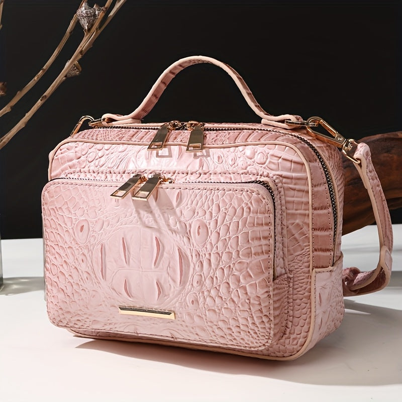 Pink textured handbag with gold accents on a white surface