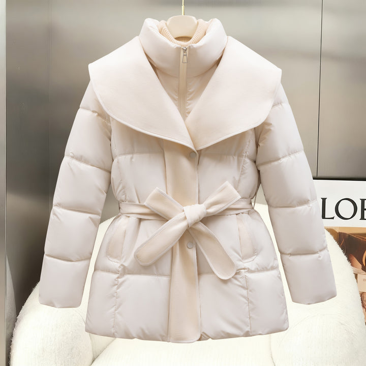 Beige belted quilted puffer coat with statement collar and bow-tie waist