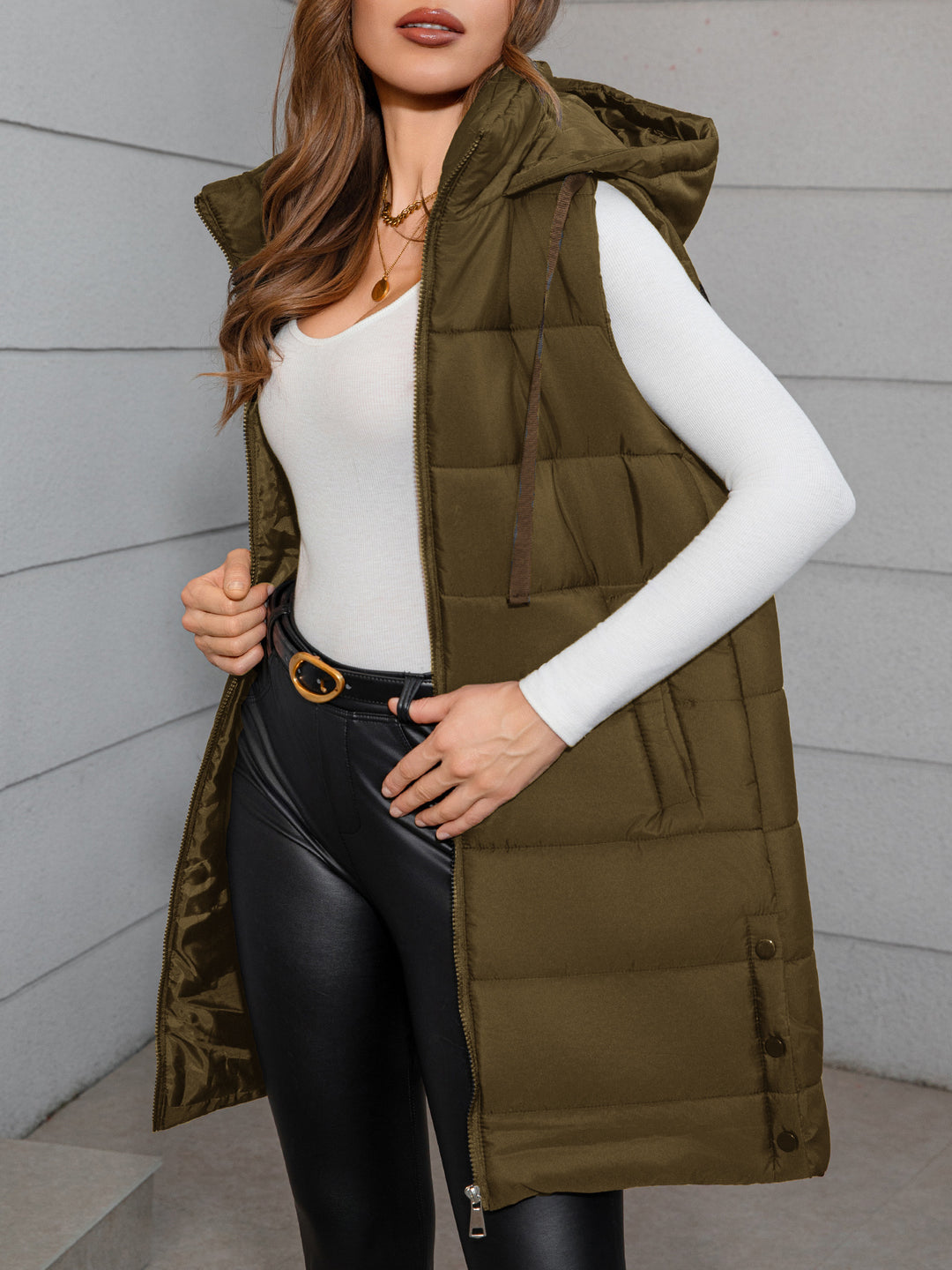 Olive green long hooded puffer vest, sleeveless quilted with drawstring hood and front zipper
