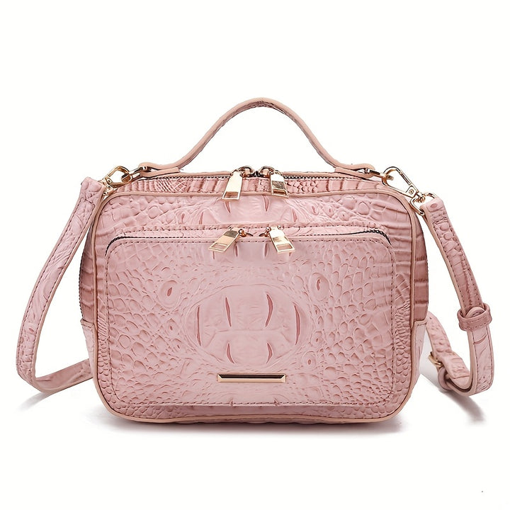 Pink textured handbag with gold accents on a white background
