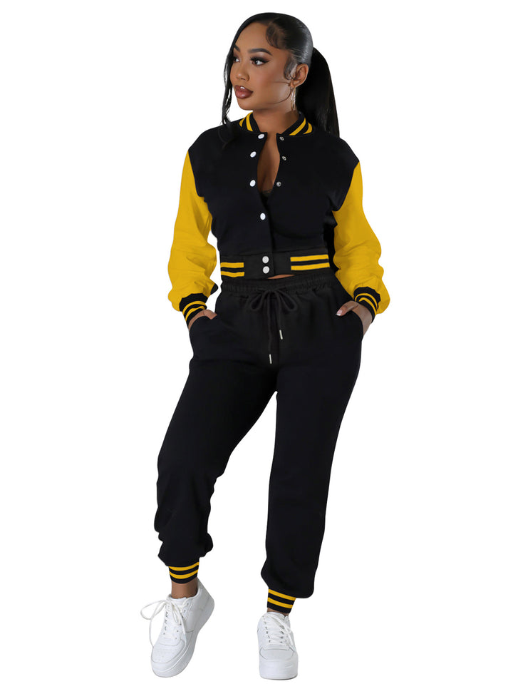 Black varsity jacket with yellow sleeves and drawstring joggers, ribbed cuffs and hem.