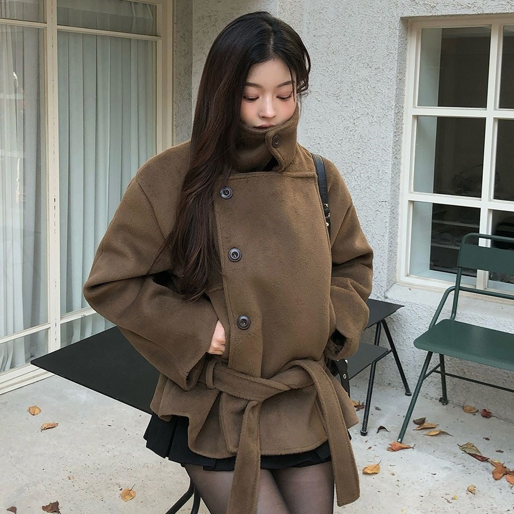 Brown wool short coat with stand-up collar, buttoned front, and belted waist tie