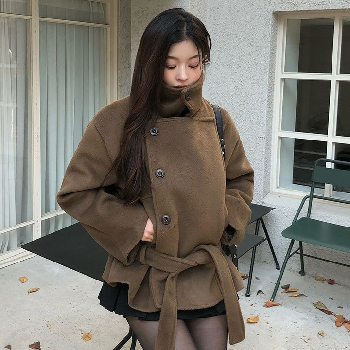 Brown wool short coat with stand-up collar, buttoned front, and belted waist tie