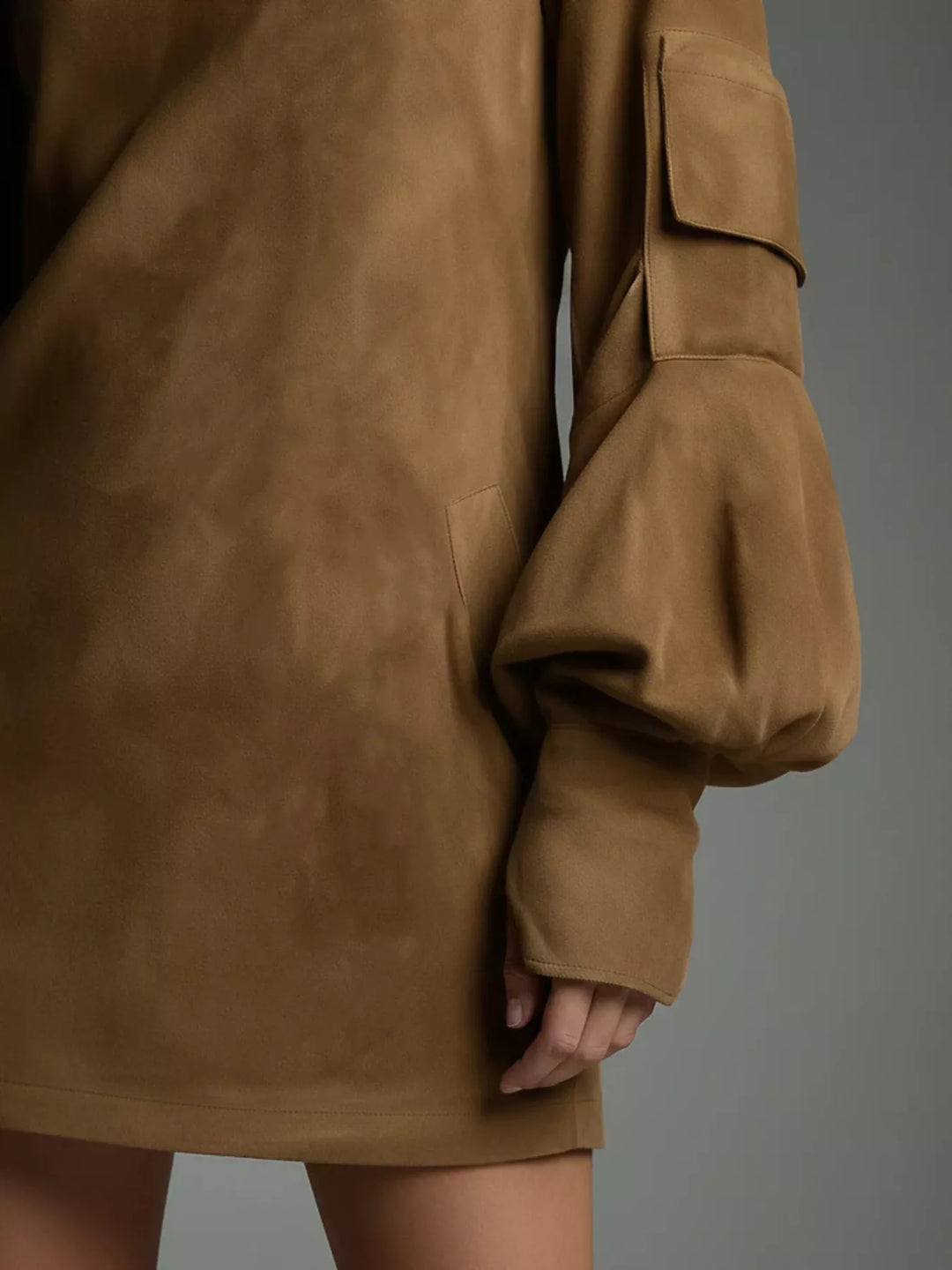 Brown suede mini dress with patch pocket and gathered lantern sleeve detail