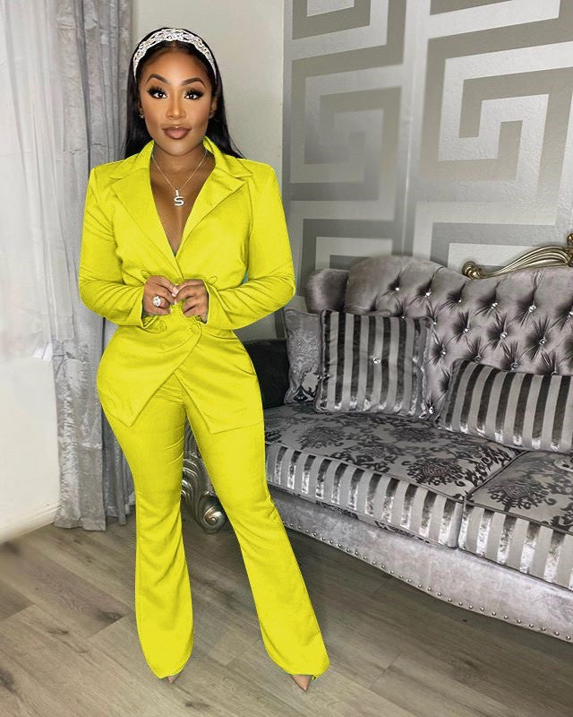 Woman wearing yellow office pants suit