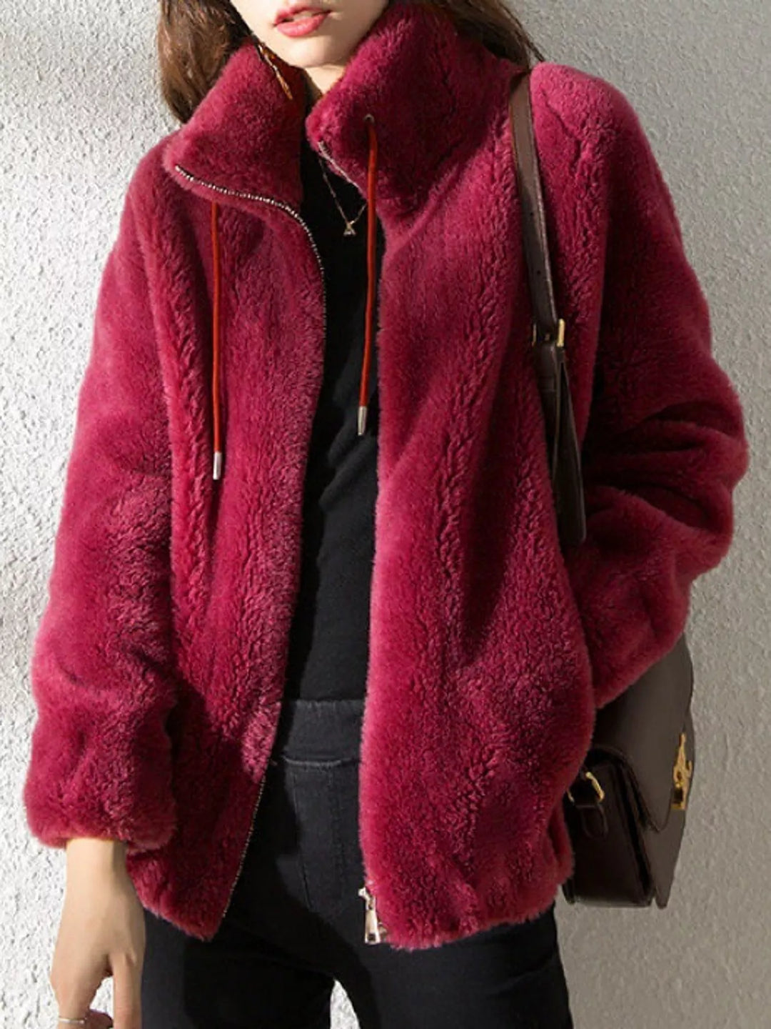 Burgundy faux fur zip jacket, front view with stand collar and drawstring ties