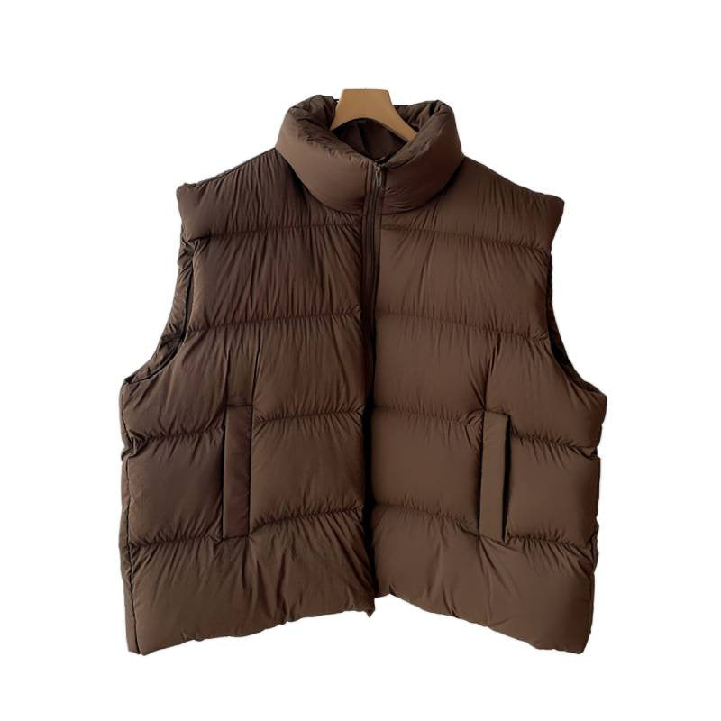 brown vest on white background: Women's Plus Size Coffee Brown Quilted Puffer Vest Front View Against A White Background
