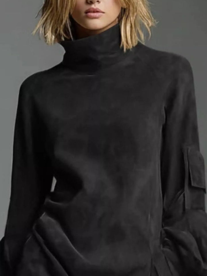 Black suede turtleneck mini dress close-up with lantern sleeve detail