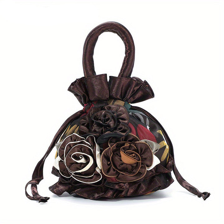 Brown handbag with floral designs on a white background