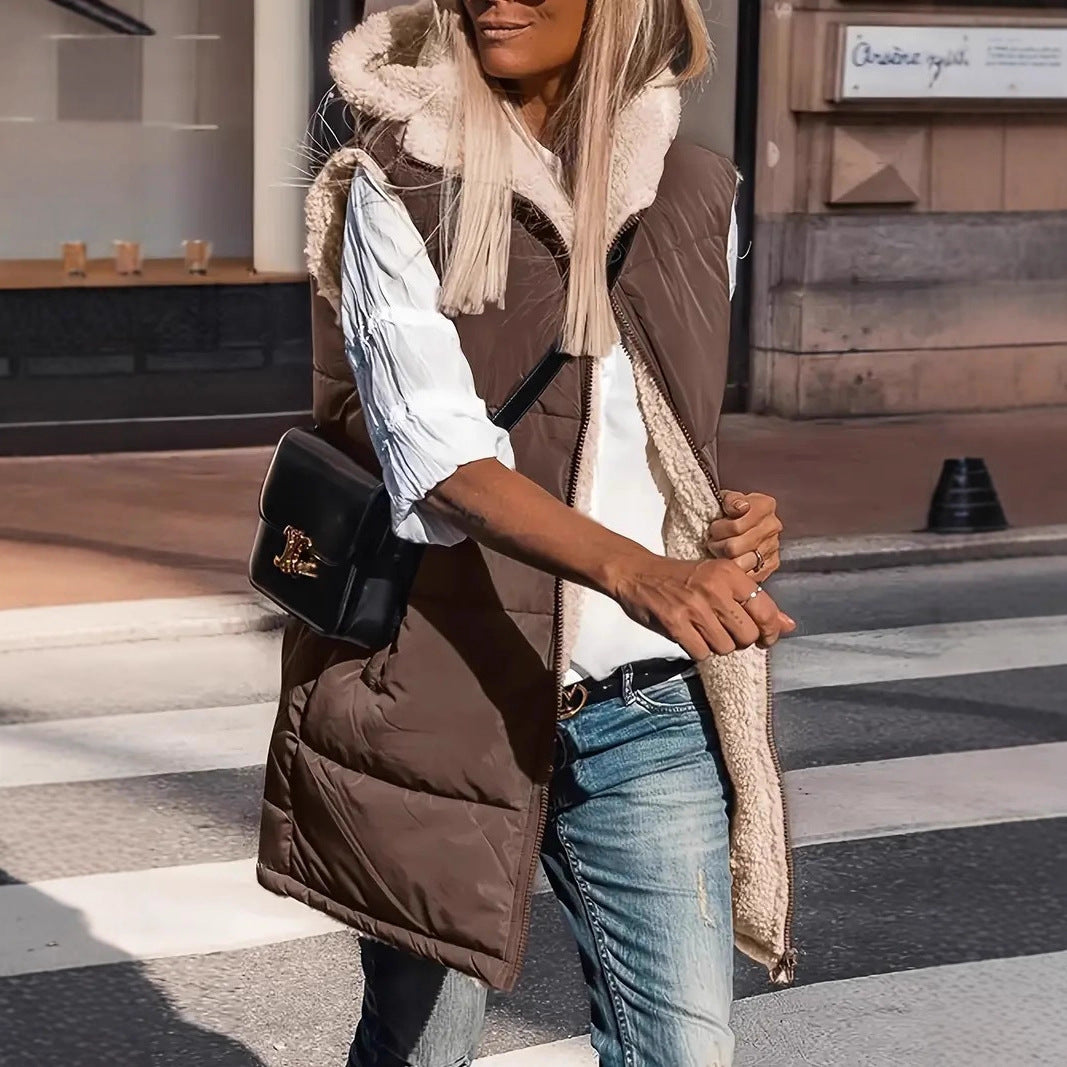 Reversible hooded puffer vest, brown with white fleece lining and front pockets