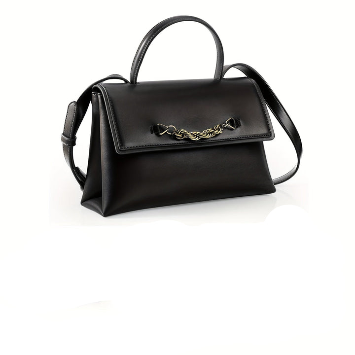 Black handbag with chain detail on a white background