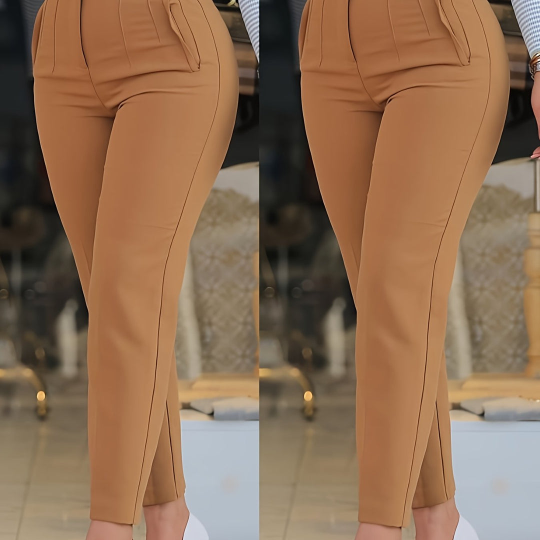 Tan pants worn by a person with a blurred indoor background