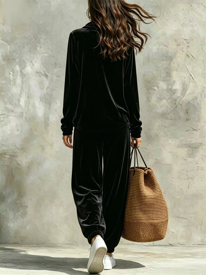 Black velvet long-sleeve cowl-neck top and jogger pants set, back view
