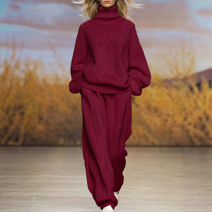 Burgundy ribbed knit two-piece set with high-neck top and wide-leg pants, long sleeves