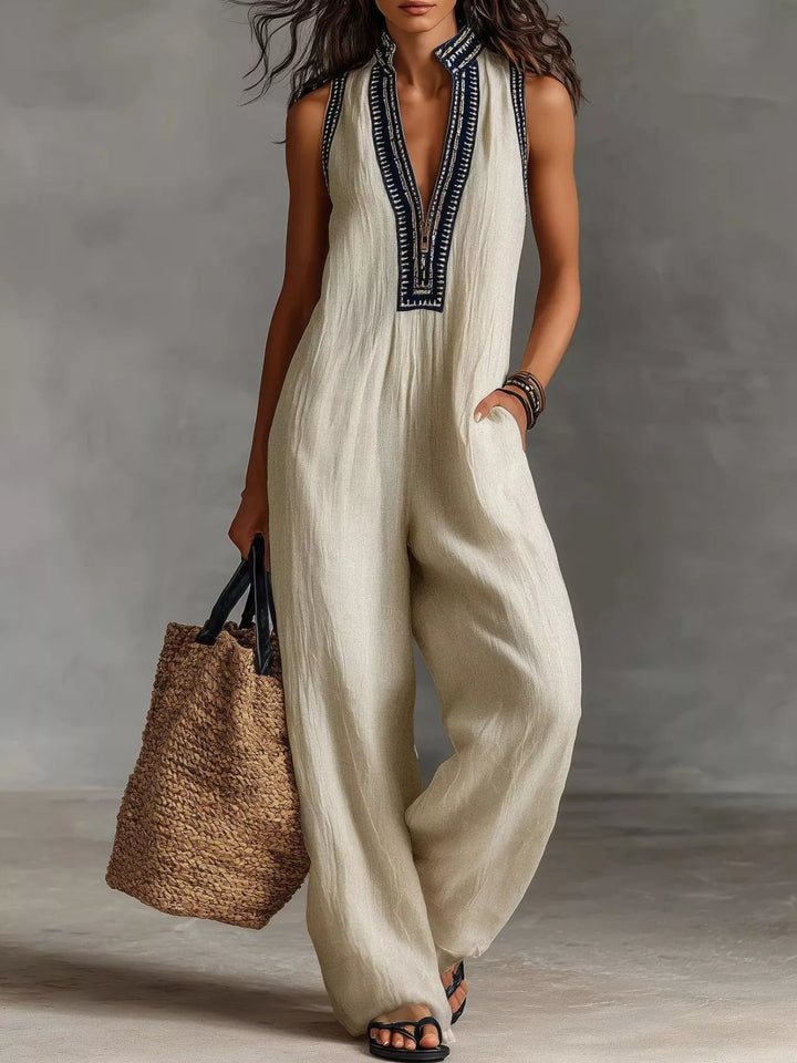 Ivory sleeveless wide-leg jumpsuit with embroidered V-neck placket