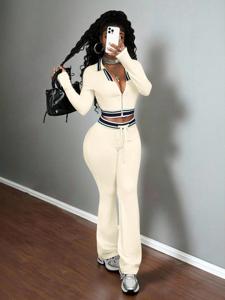 Apricot women’s high-neck zip crop top and slim track pants set with striped trim