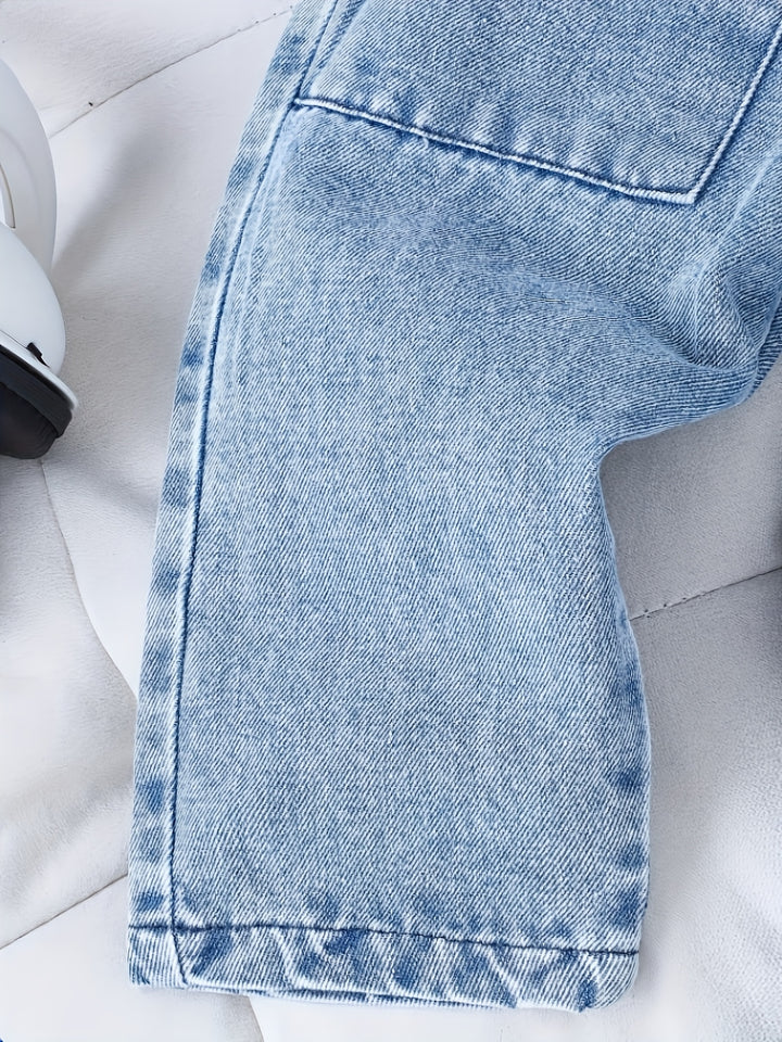 Close-up of a blue denim jacket on a white background