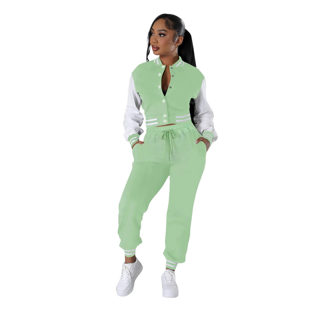 Light green varsity jacket with white sleeves and drawstring joggers, ribbed cuffs.