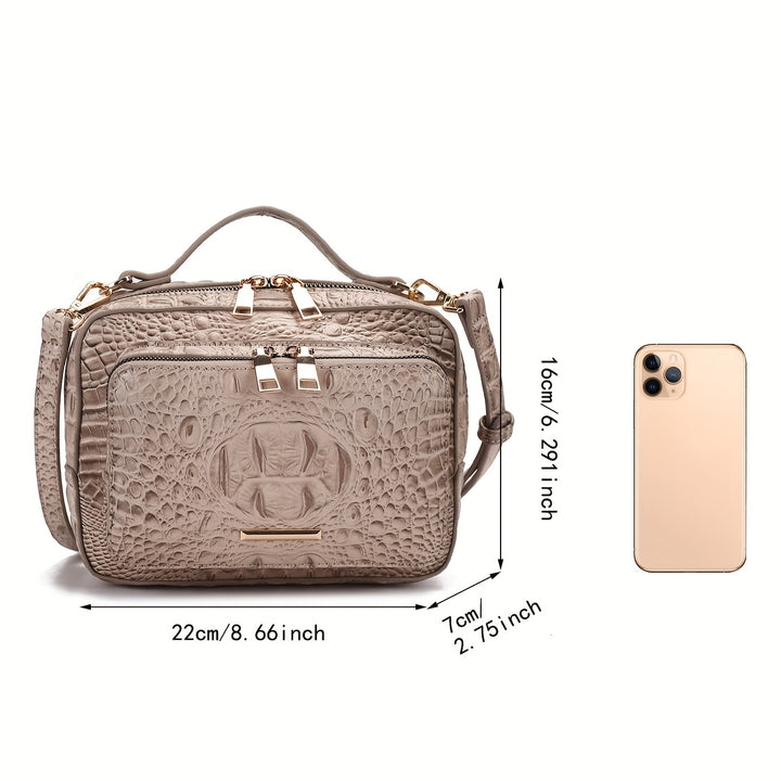 Beige textured handbag with dimensions and an iPhone for scale on a white background