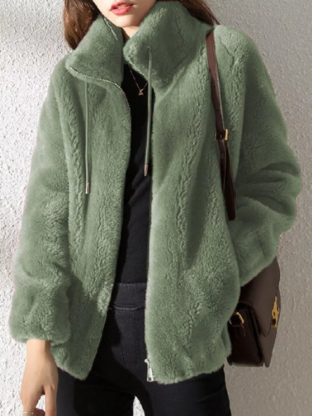 Green faux fur zip jacket with stand collar and drawstring, long sleeves