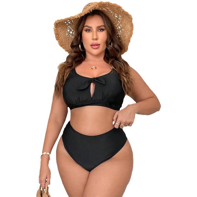 Women's wearing black Plus Size Hollow-Out One-Piece Wrap Vacation Swimsuit
