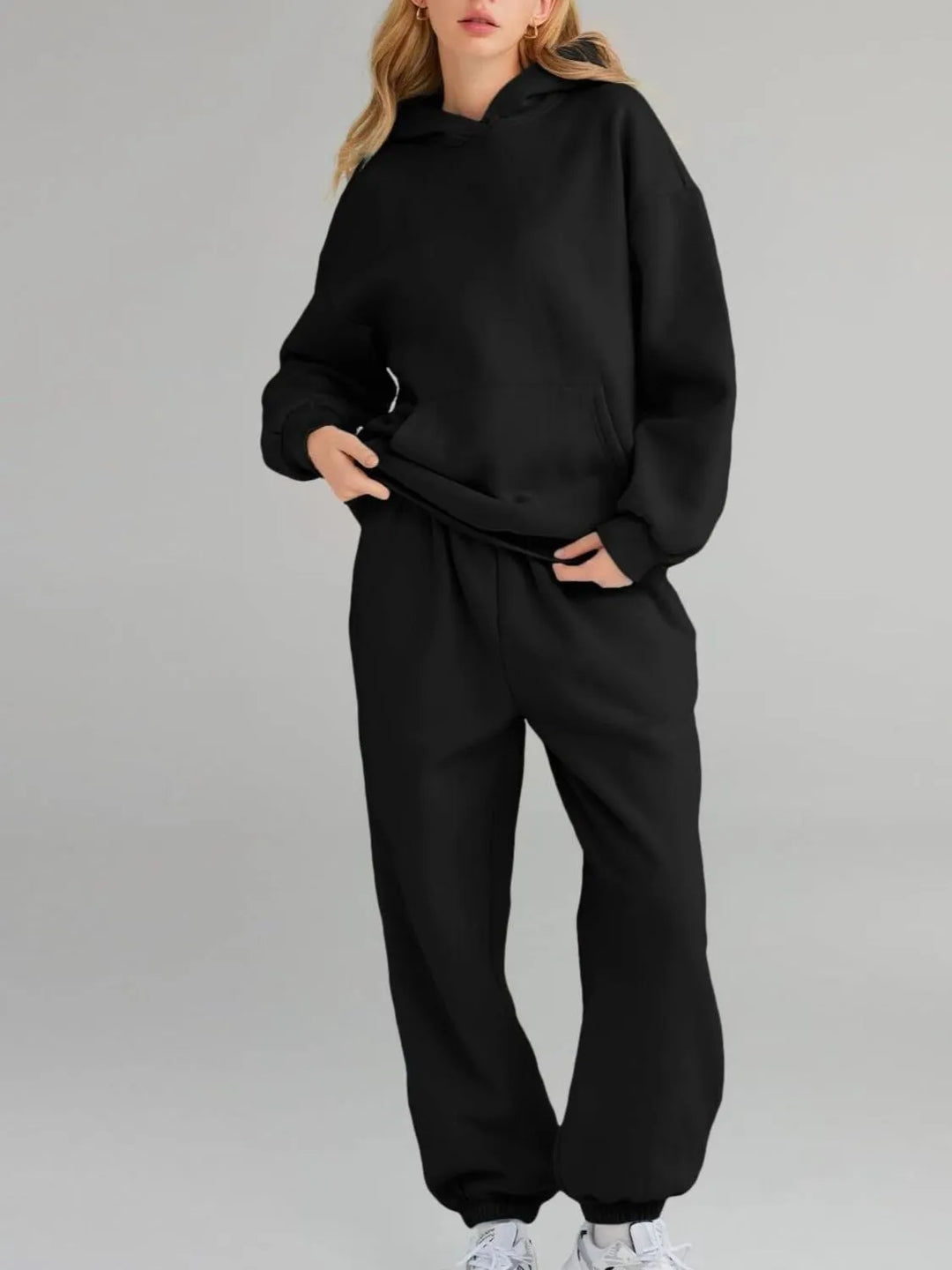Plus-size black hoodie and jogger set with kangaroo pocket and hood