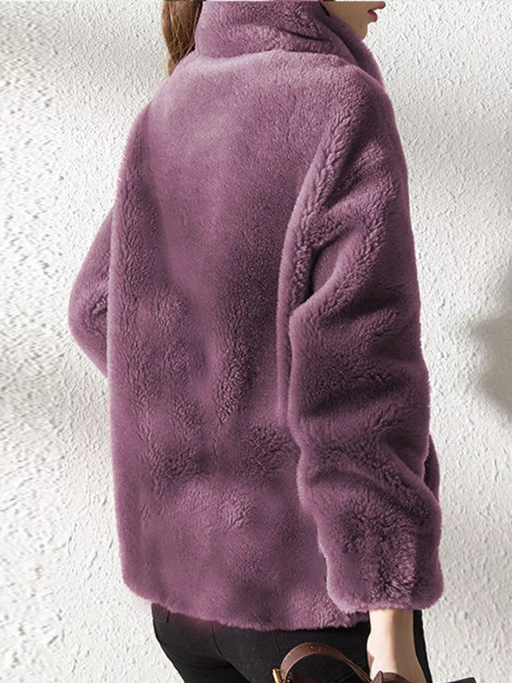 Purple faux fur zip jacket, side view with stand collar and drawstring