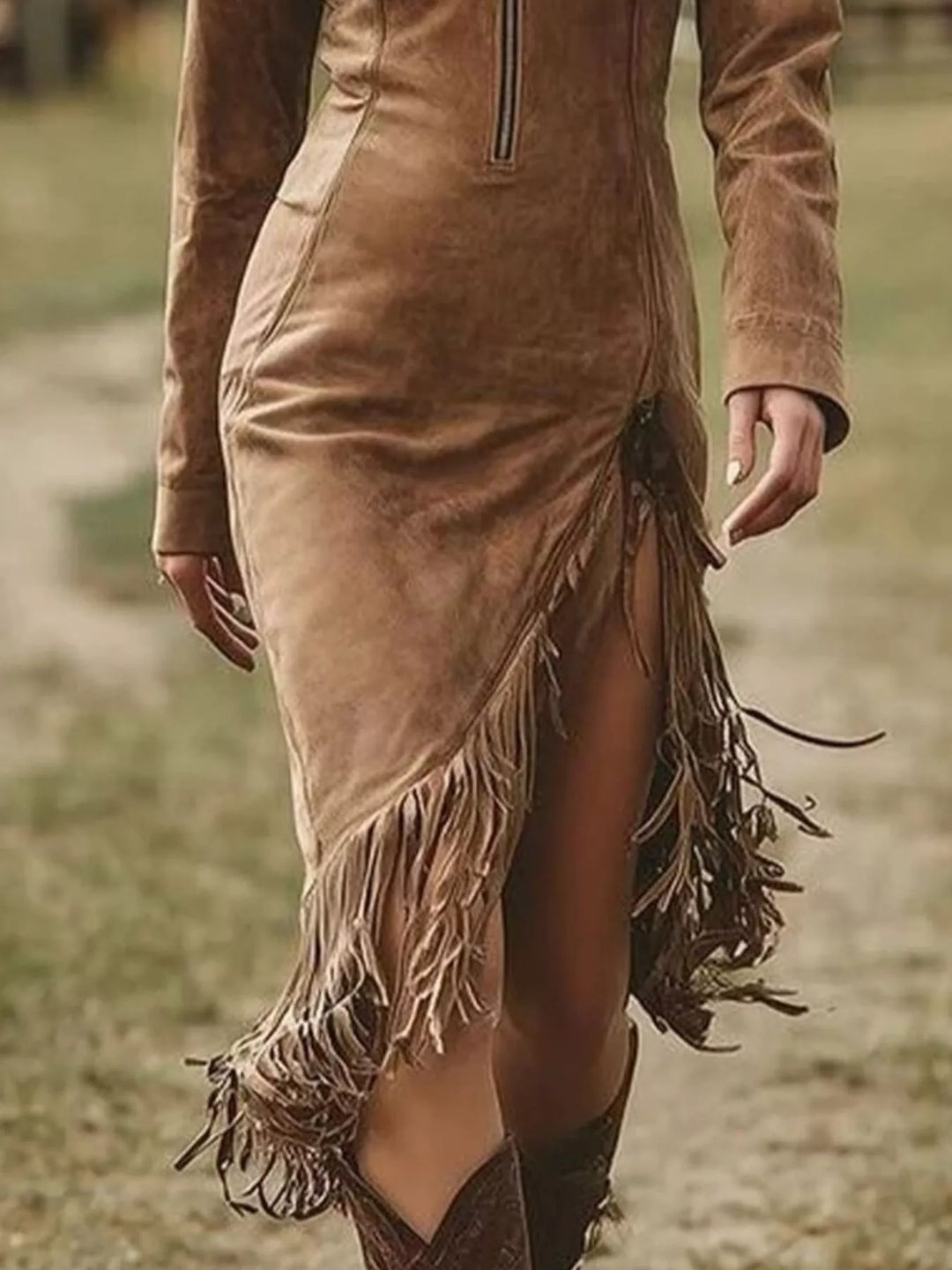 Dark brown bodycon dress with zip front and fringe detailing at hem