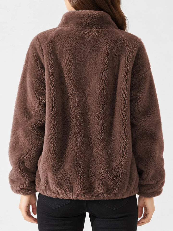 Dark brown faux fur zip jacket with stand collar, back view