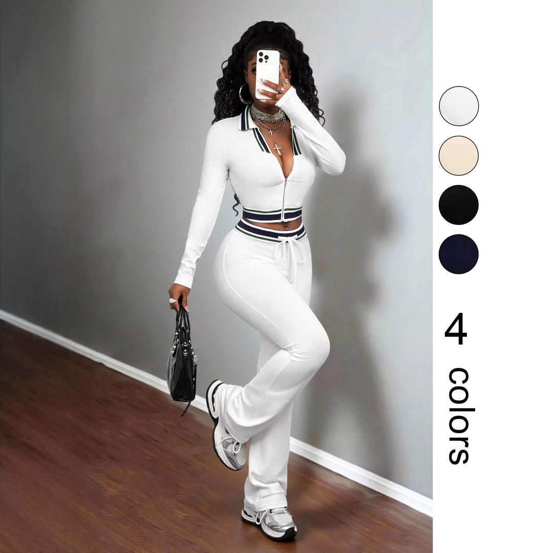 White women’s high-neck zip crop top and slim track pants with striped waist band