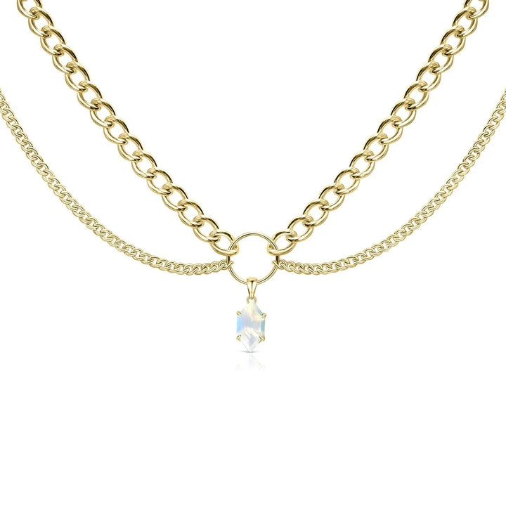 Layered gold-tone chain necklace with clear faceted teardrop pendant