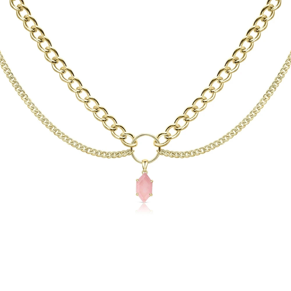 Layered gold-tone chain necklace with pink faceted teardrop pendant