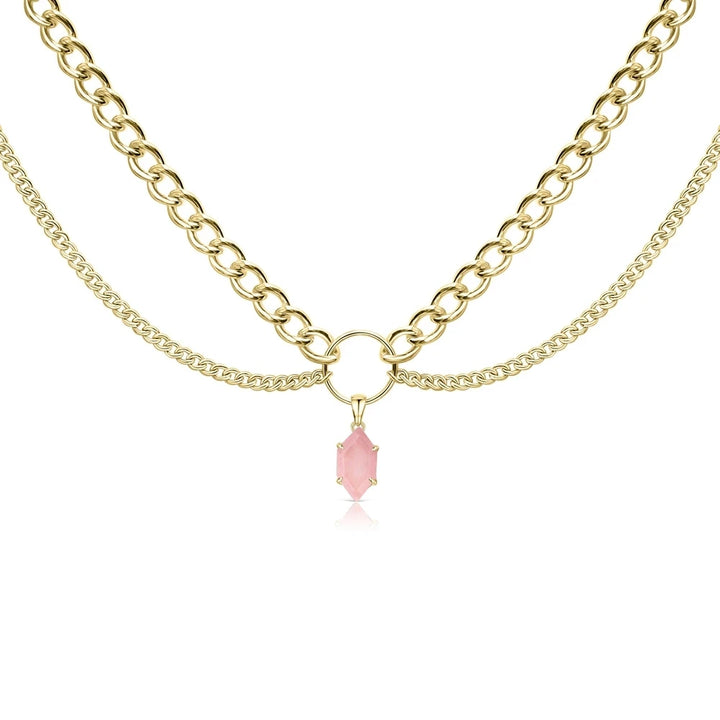 Layered gold-tone chain necklace with pink faceted teardrop pendant
