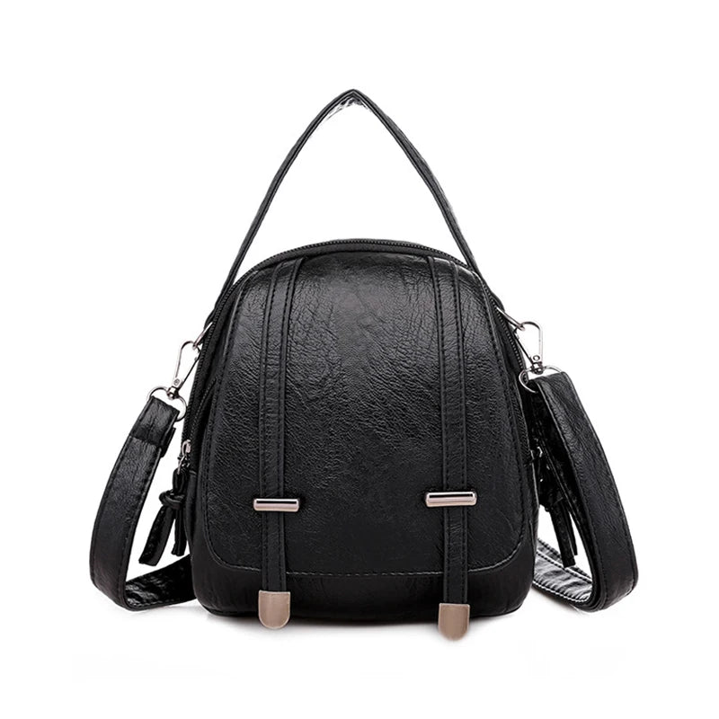 Black backpack with straps on a white background