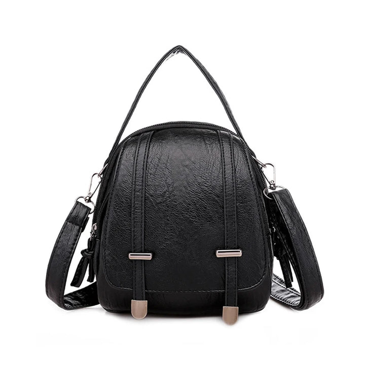 Black backpack with straps on a white background