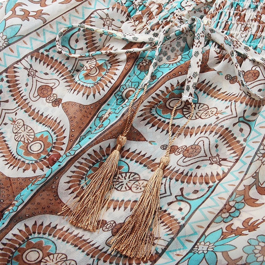 Patterned fabric with gold tassels on a decorative background