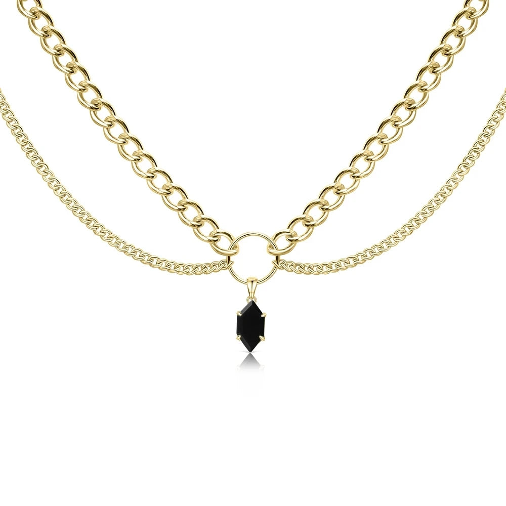Gold-tone double-chain necklace with dark crystal teardrop pendant at center.