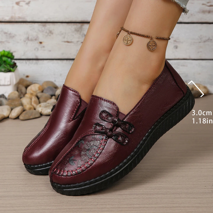 Women’s leather loafers, burgundy slip-on mule with butterfly-knot detail and stitched vamp