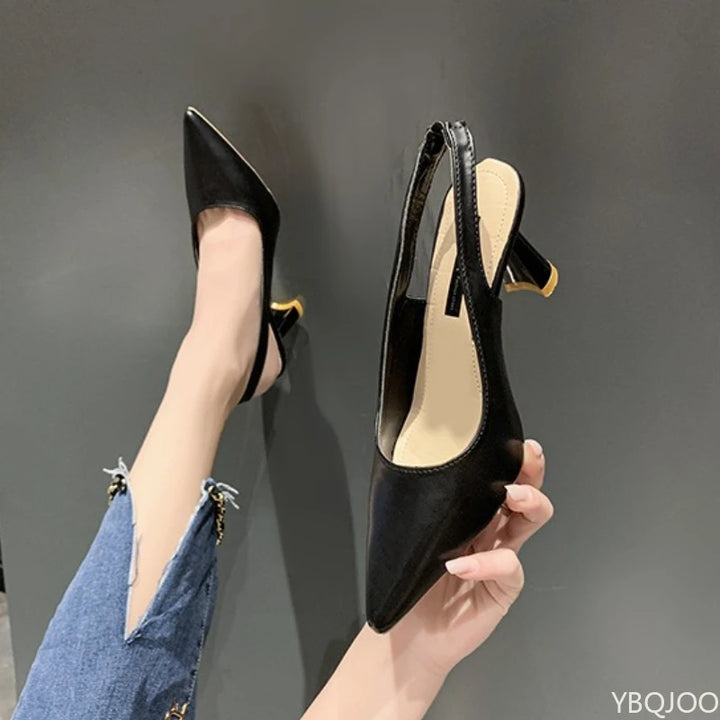 Women’s pointed-toe thin high-heel slingback pumps, black faux leather with open back