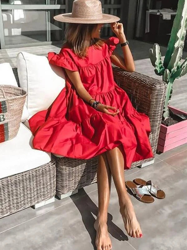 Flowy ruffle midi dress in bright red with puff sleeves and tiered skirt