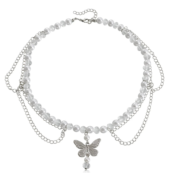 Ivory pearl multi-strand necklace with butterfly charm and teardrop drop, silver-tone chain