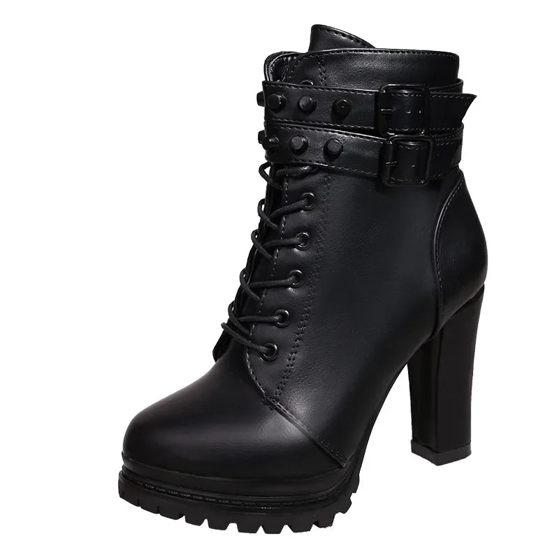 Black high-heeled boot with buckle details on a white background