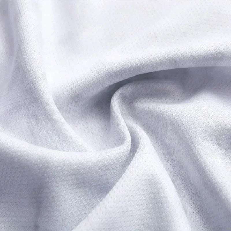 Light gray knit jersey fabric close-up with soft heather texture