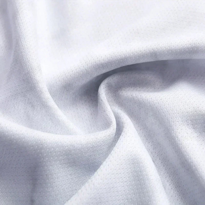 Light gray knit jersey fabric close-up with soft heather texture